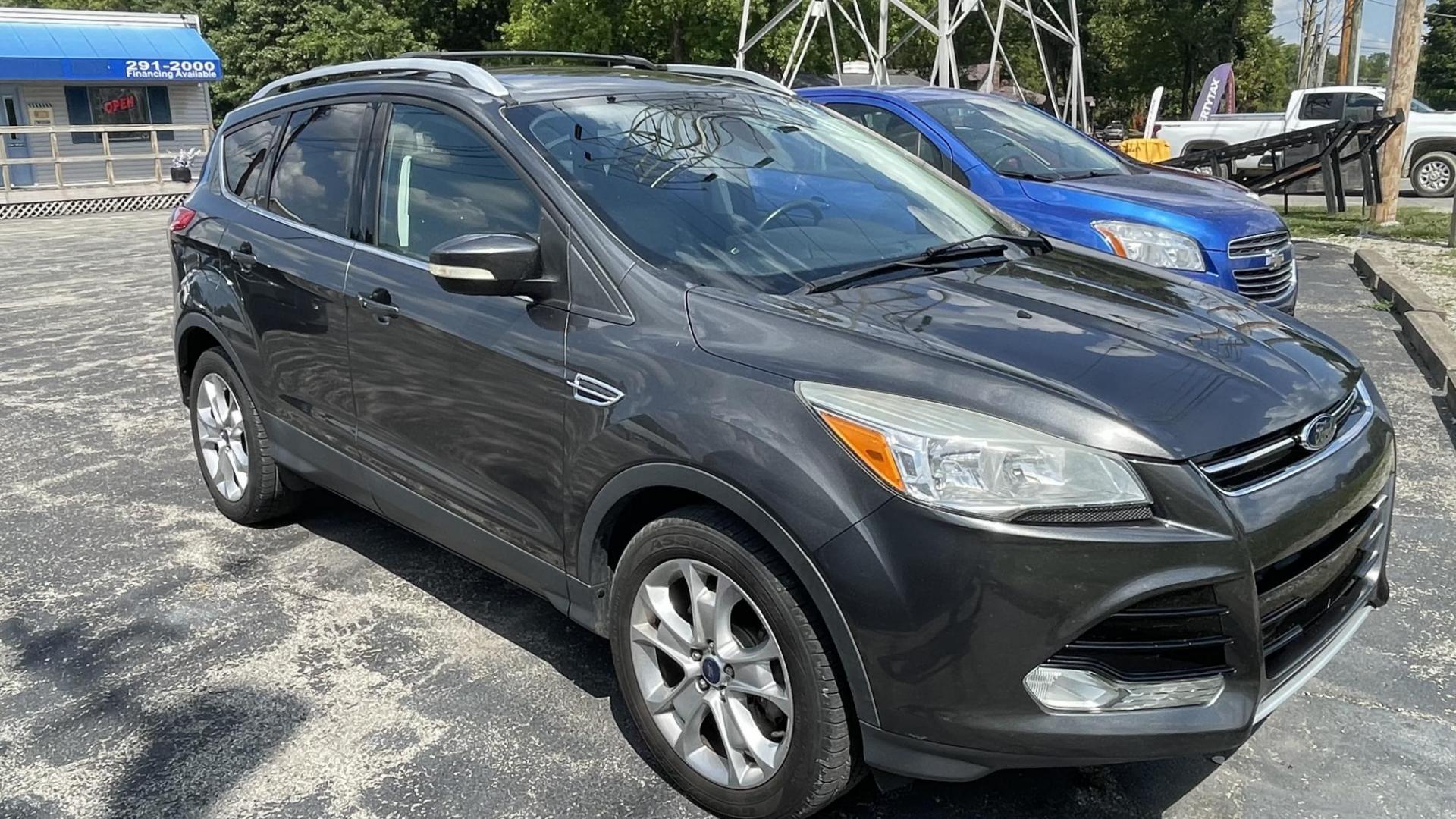 2016 Ford Escape Titanium 4WD (1FMCU9J97GU) with an 2.0L L4 DOHC 16V engine, 6-Speed Automatic transmission, located at 2710A Westlane Rd., Indianapolis, IN, 46268, (317) 291-2000, 39.885670, -86.208160 - Photo#1