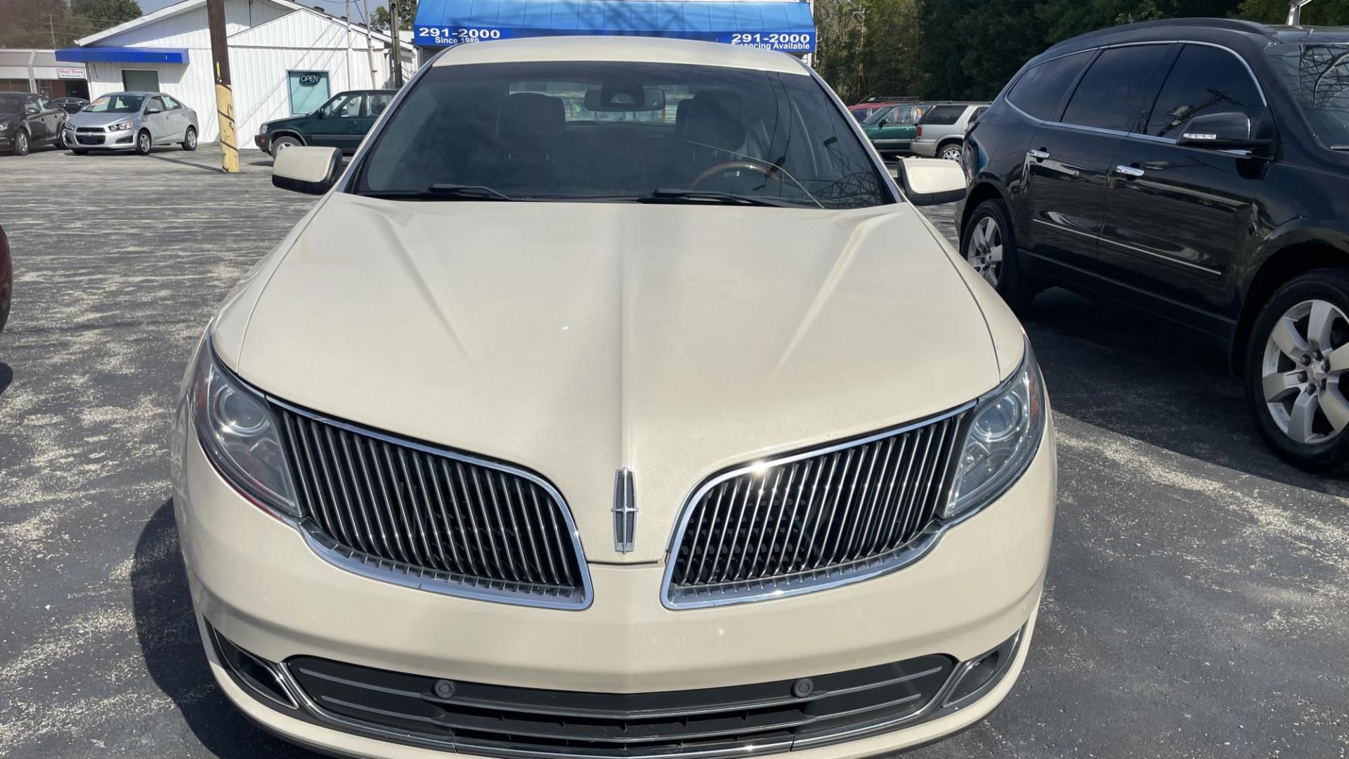 2014 CREAM /BLACK Lincoln MKS FWD (1LNHL9DK4EG) with an 3.5L V6 DOHC 24V engine, 6-Speed Automatic transmission, located at 2710A Westlane Rd., Indianapolis, IN, 46268, (317) 291-2000, 39.885670, -86.208160 - Photo#2