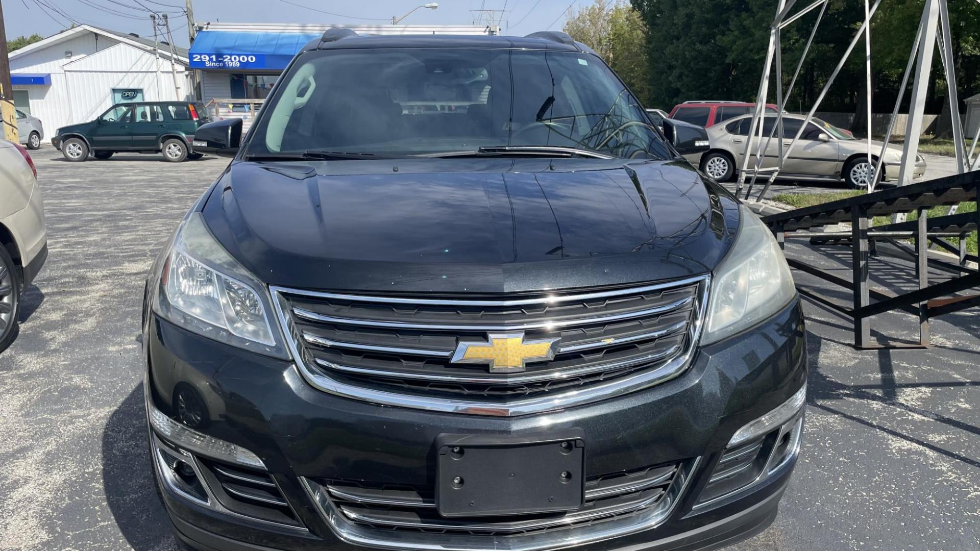 2014 BLACK /BLACK Chevrolet Traverse LTZ AWD (1GNKVJKD9EJ) with an 3.6L V6 DOHC 24V engine, 6-Speed Automatic transmission, located at 2710A Westlane Rd., Indianapolis, IN, 46268, (317) 291-2000, 39.885670, -86.208160 - Photo#2