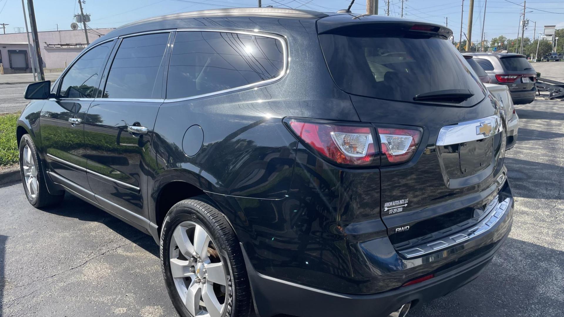 2014 BLACK /BLACK Chevrolet Traverse LTZ AWD (1GNKVJKD9EJ) with an 3.6L V6 DOHC 24V engine, 6-Speed Automatic transmission, located at 2710A Westlane Rd., Indianapolis, IN, 46268, (317) 291-2000, 39.885670, -86.208160 - Photo#5