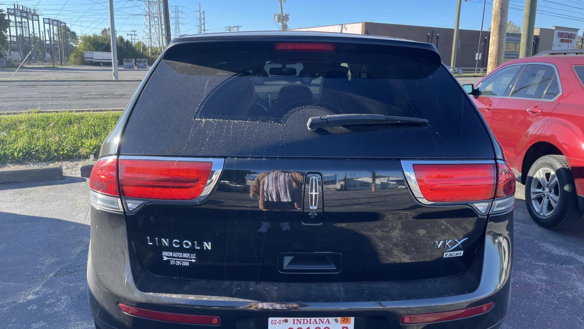 2013 BLACK /BLACK Lincoln MKX AWD (2LMDJ8JK7DB) with an 3.7L V6 DOHC 24V engine, 6-Speed Automatic transmission, located at 2710A Westlane Rd., Indianapolis, IN, 46268, (317) 291-2000, 39.885670, -86.208160 - Photo#5