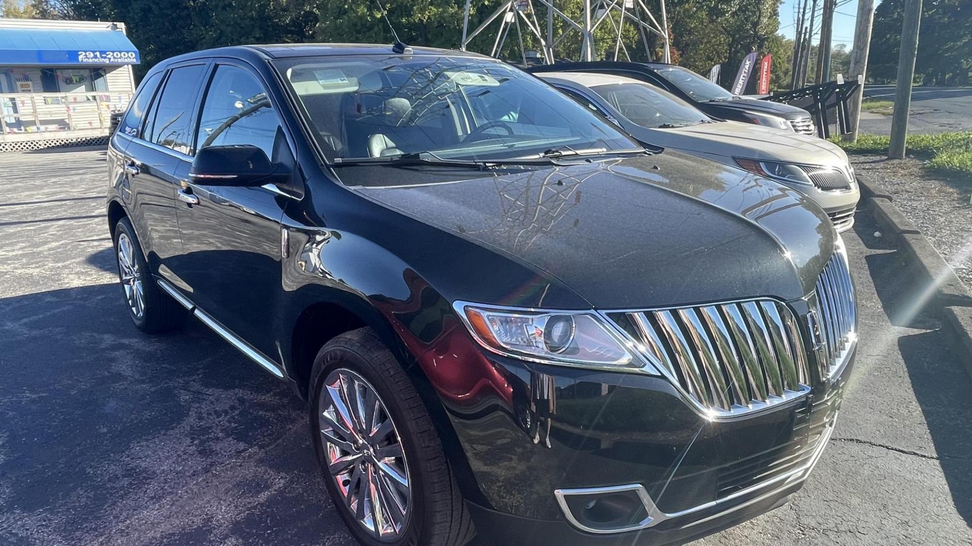 2013 BLACK /BLACK Lincoln MKX AWD (2LMDJ8JK7DB) with an 3.7L V6 DOHC 24V engine, 6-Speed Automatic transmission, located at 2710A Westlane Rd., Indianapolis, IN, 46268, (317) 291-2000, 39.885670, -86.208160 - Photo#1