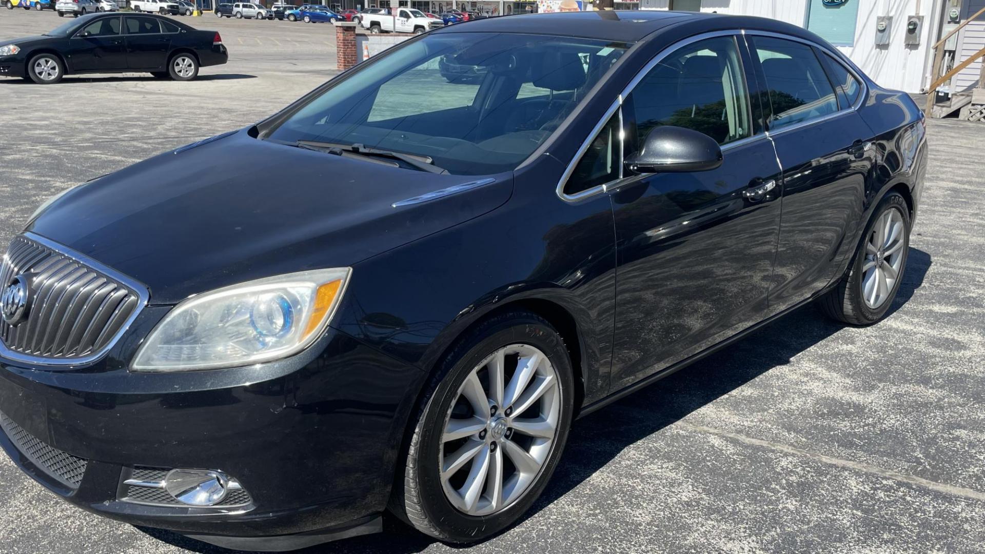 2013 BLACK /BLACK Buick Verano Leather (1G4PS5SK3D4) with an 2.4L L4 DOHC 16V FFV engine, 6-Speed Automatic transmission, located at 2710A Westlane Rd., Indianapolis, IN, 46268, (317) 291-2000, 39.885670, -86.208160 - Photo#0