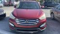 2013 MAROON Hyundai Santa Fe Sport 2.0 FWD (5XYZU3LAXDG) with an 2.0L L4 DOHC 16V engine, 6-Speed Automatic transmission, located at 2710A Westlane Rd., Indianapolis, IN, 46268, (317) 291-2000, 39.885670, -86.208160 - Photo#2