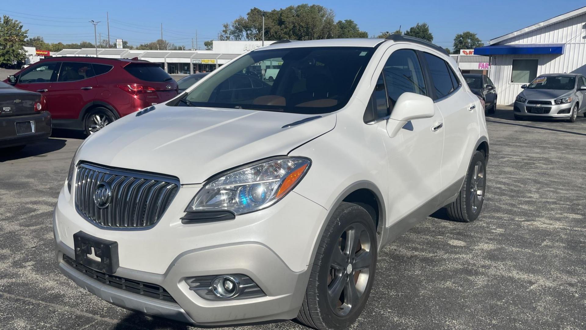 2013 WHITE Buick Encore Leather AWD (KL4CJGSB4DB) with an 1.4L L4 DOHC 16V TURBO engine, 6-Speed Automatic transmission, located at 2710A Westlane Rd., Indianapolis, IN, 46268, (317) 291-2000, 39.885670, -86.208160 - Photo#0