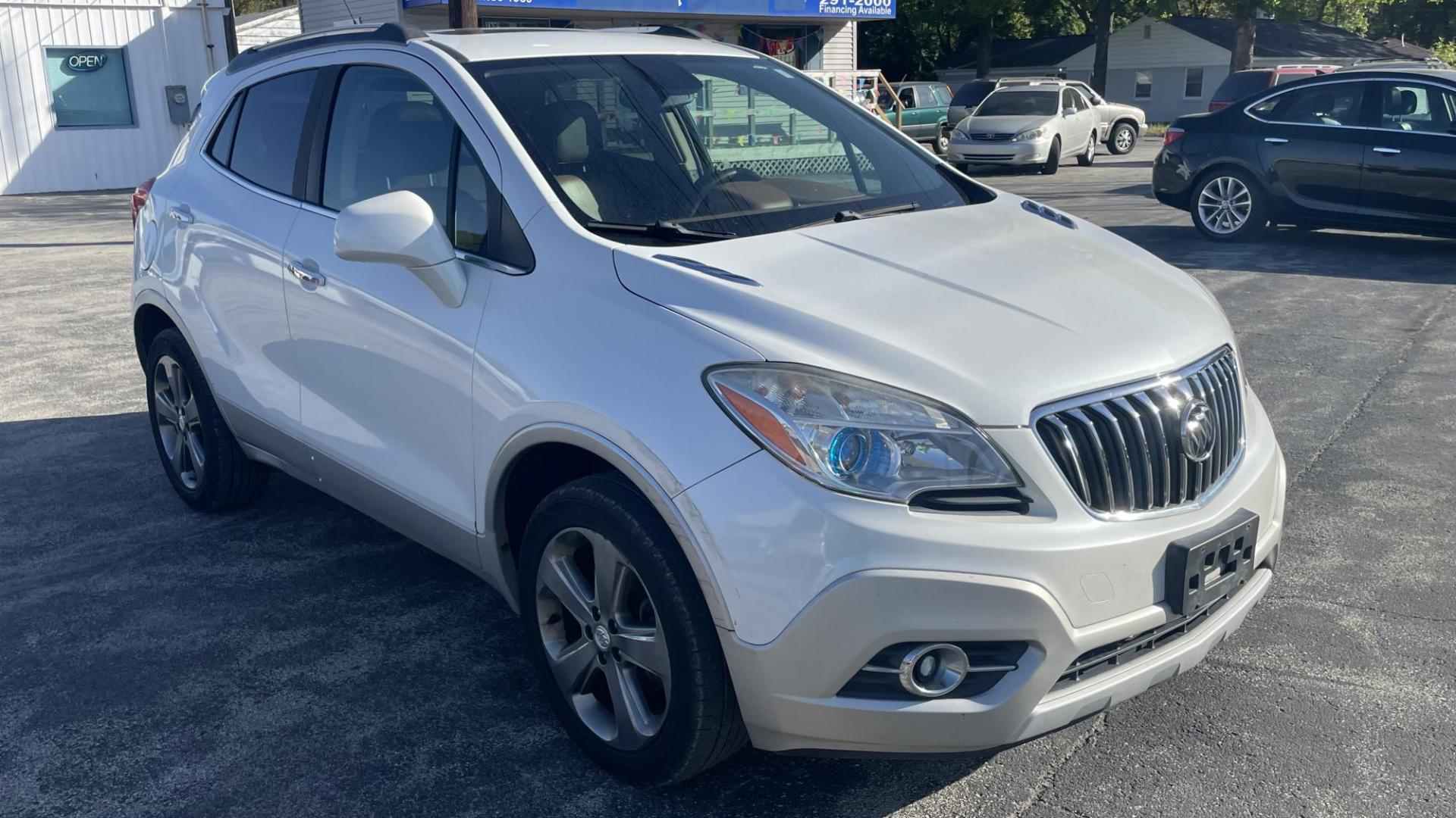 2013 WHITE Buick Encore Leather AWD (KL4CJGSB4DB) with an 1.4L L4 DOHC 16V TURBO engine, 6-Speed Automatic transmission, located at 2710A Westlane Rd., Indianapolis, IN, 46268, (317) 291-2000, 39.885670, -86.208160 - Photo#1