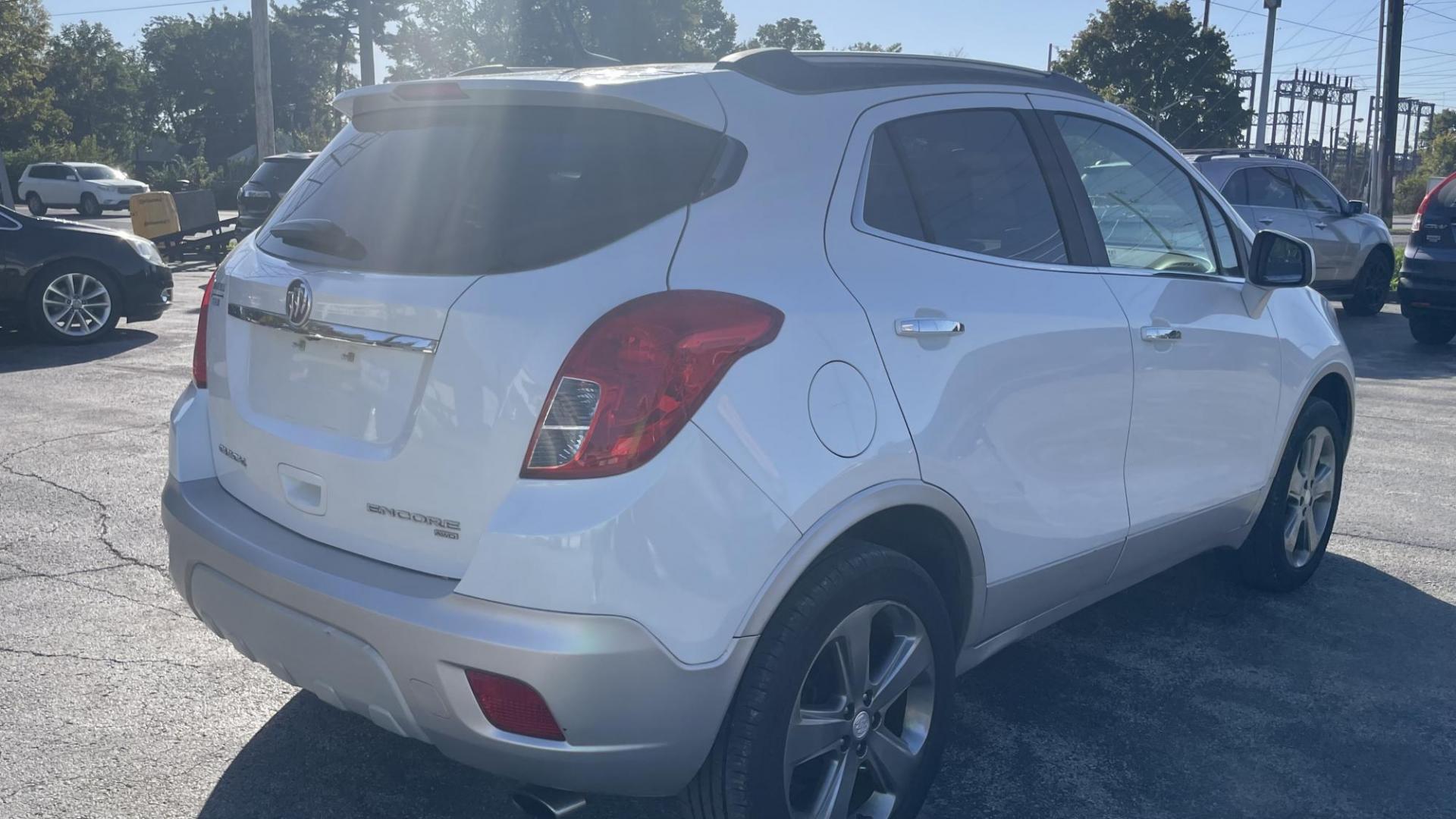 2013 WHITE Buick Encore Leather AWD (KL4CJGSB4DB) with an 1.4L L4 DOHC 16V TURBO engine, 6-Speed Automatic transmission, located at 2710A Westlane Rd., Indianapolis, IN, 46268, (317) 291-2000, 39.885670, -86.208160 - Photo#5