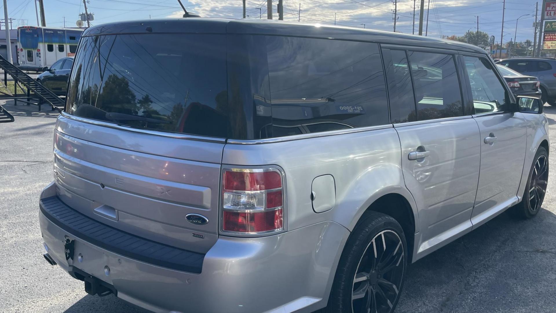 2014 Silver /GREY Ford Flex SEL AWD (2FMHK6C81EB) with an 3.5L V6 DOHC 24V engine, 6-Speed Automatic Overdrive transmission, located at 2710A Westlane Rd., Indianapolis, IN, 46268, (317) 291-2000, 39.885670, -86.208160 - Photo#4