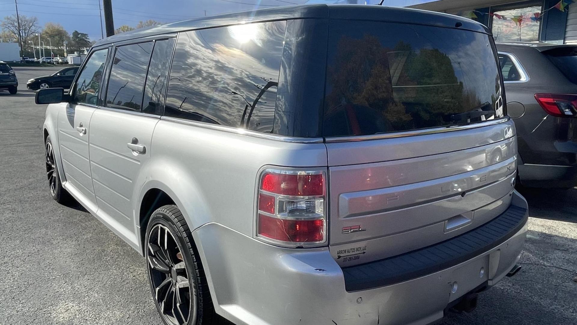 2014 Silver /GREY Ford Flex SEL AWD (2FMHK6C81EB) with an 3.5L V6 DOHC 24V engine, 6-Speed Automatic Overdrive transmission, located at 2710A Westlane Rd., Indianapolis, IN, 46268, (317) 291-2000, 39.885670, -86.208160 - Photo#3