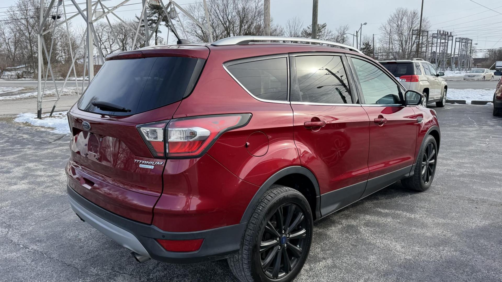 2017 RED /BLACK Ford Escape Titanium FWD (1FMCU0JD5HU) with an 1.5L L4 DOHC 16V engine, 6A transmission, located at 2710A Westlane Rd., Indianapolis, IN, 46268, (317) 291-2000, 39.885670, -86.208160 - Photo#3