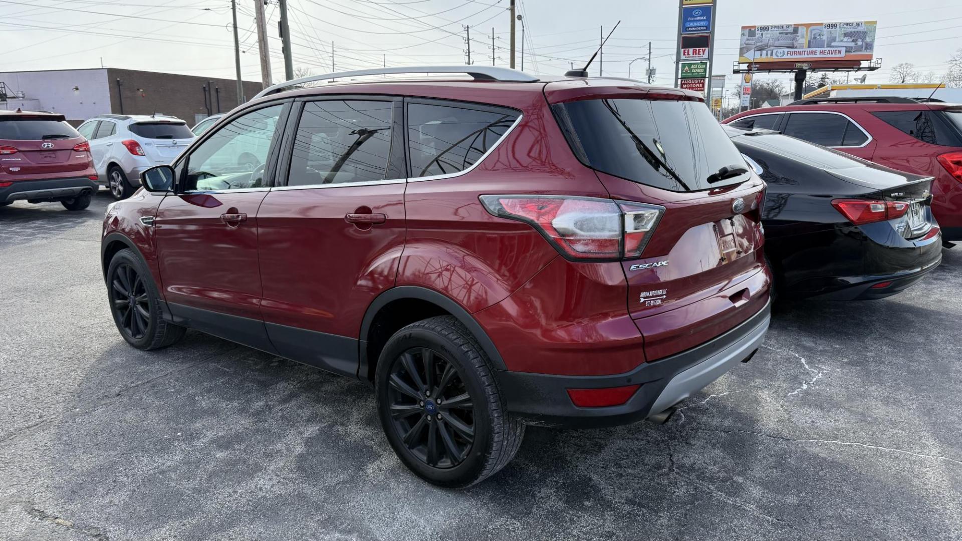 2017 RED /BLACK Ford Escape Titanium FWD (1FMCU0JD5HU) with an 1.5L L4 DOHC 16V engine, 6A transmission, located at 2710A Westlane Rd., Indianapolis, IN, 46268, (317) 291-2000, 39.885670, -86.208160 - Photo#4