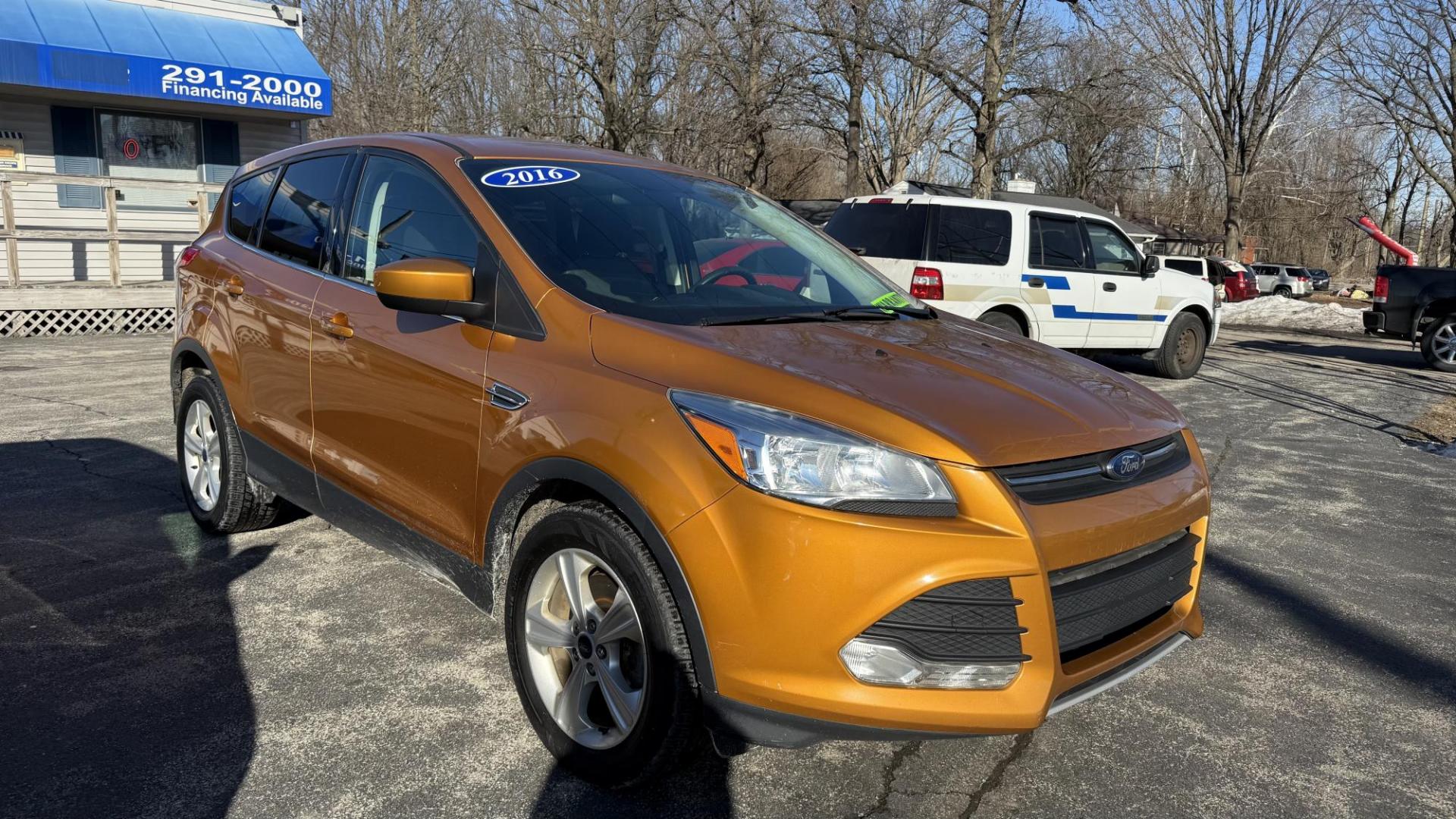 2016 ORANGE/COPPER /GRAY Ford Escape SE 4WD (1FMCU9GX1GU) with an 1.6L L4 DOHC 16V engine, 6-Speed Automatic transmission, located at 2710A Westlane Rd., Indianapolis, IN, 46268, (317) 291-2000, 39.885670, -86.208160 - Photo#0