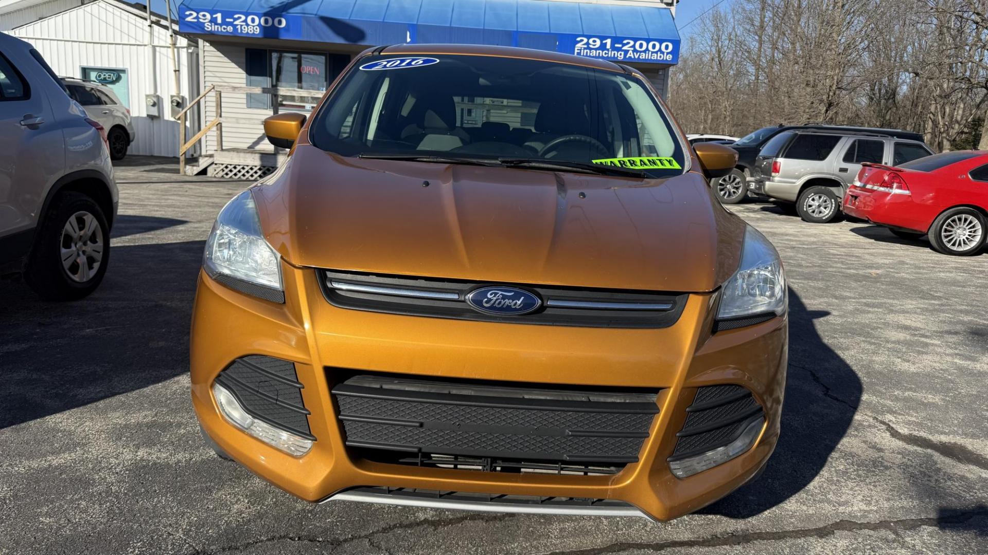 2016 ORANGE/COPPER /GRAY Ford Escape SE 4WD (1FMCU9GX1GU) with an 1.6L L4 DOHC 16V engine, 6-Speed Automatic transmission, located at 2710A Westlane Rd., Indianapolis, IN, 46268, (317) 291-2000, 39.885670, -86.208160 - Photo#1