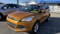 2016 ORANGE/COPPER /GRAY Ford Escape SE 4WD (1FMCU9GX1GU) with an 1.6L L4 DOHC 16V engine, 6-Speed Automatic transmission, located at 2710A Westlane Rd., Indianapolis, IN, 46268, (317) 291-2000, 39.885670, -86.208160 - Photo#4