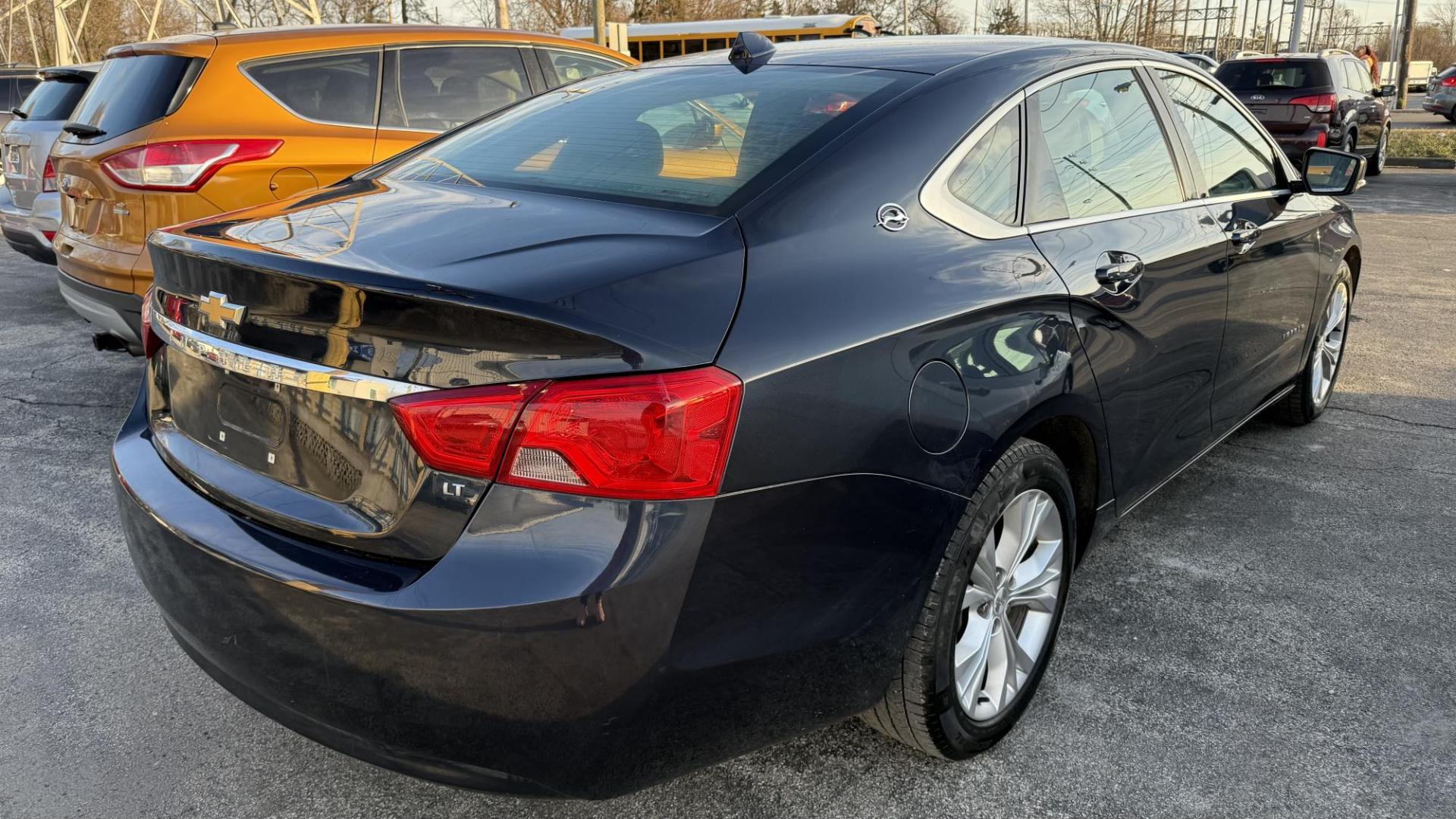 2014 BLUE /BLACK Chevrolet Impala 2LT (2G1125S30E9) with an 3.6L V6 DOHC 16V FFV engine, 6-Speed Automatic transmission, located at 2710A Westlane Rd., Indianapolis, IN, 46268, (317) 291-2000, 39.885670, -86.208160 - Photo#3