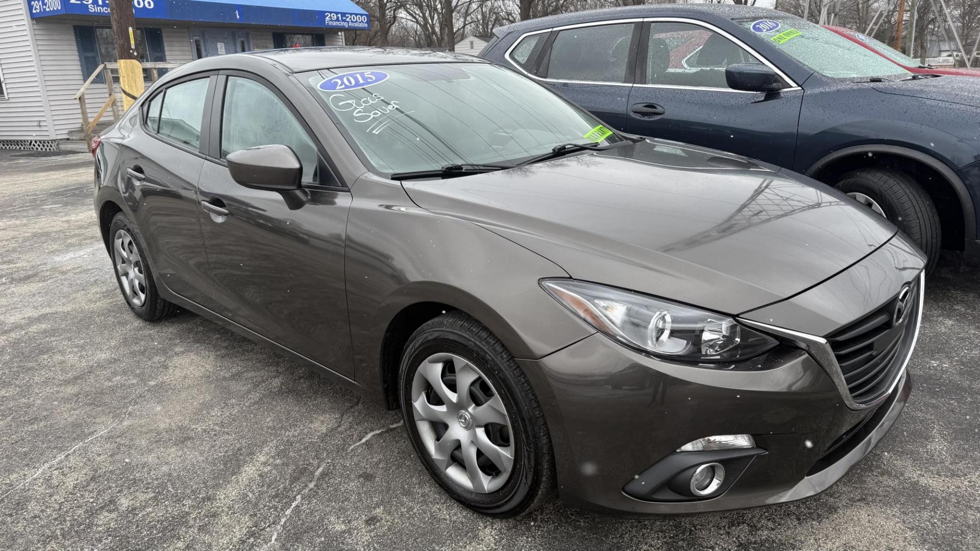 2015 DARK GRAY /GRAY Mazda MAZDA3 i Sport AT 4-Door (JM1BM1U77F1) with an 2.0L L4 DOHC 16V engine, 6-Speed Automatic transmission, located at 2710A Westlane Rd., Indianapolis, IN, 46268, (317) 291-2000, 39.885670, -86.208160 - Photo#0