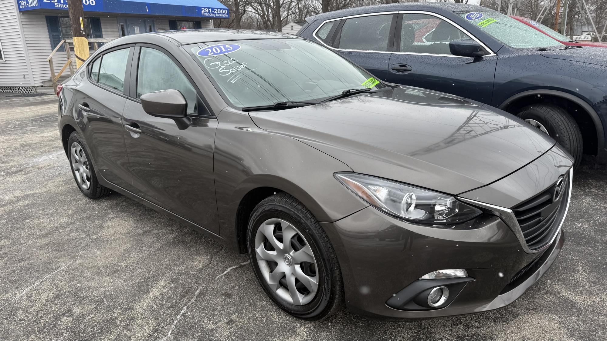 photo of 2015 Mazda MAZDA3 i Sport AT 4-Door / OUTSIDE FINANCE / WARRANTY, GAP, ROADSIDE ASSISTANCE AVAILABLE