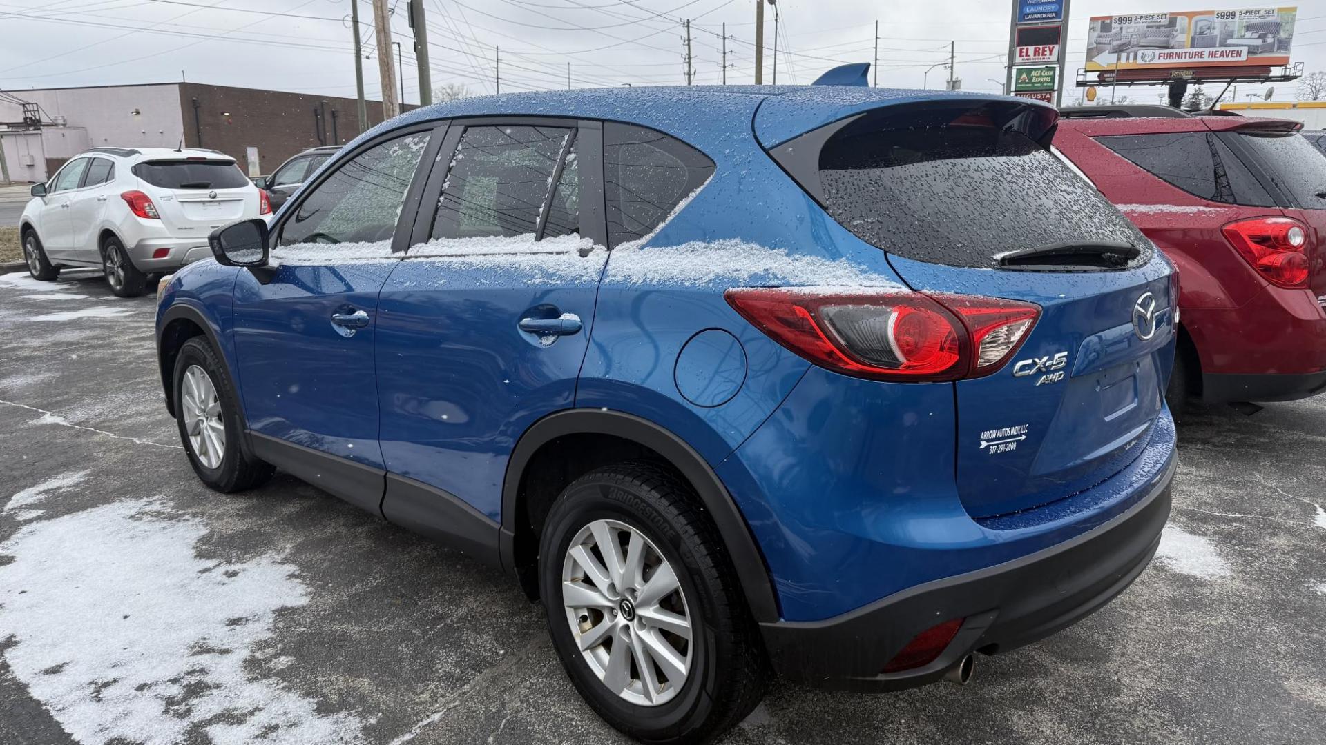 2013 BLUE /GRAY Mazda CX-5 Sport AWD (JM3KE4BE7D0) with an 2.0L L4 DOHC 16V engine, 6-Speed Automatic transmission, located at 2710A Westlane Rd., Indianapolis, IN, 46268, (317) 291-2000, 39.885670, -86.208160 - Photo#4