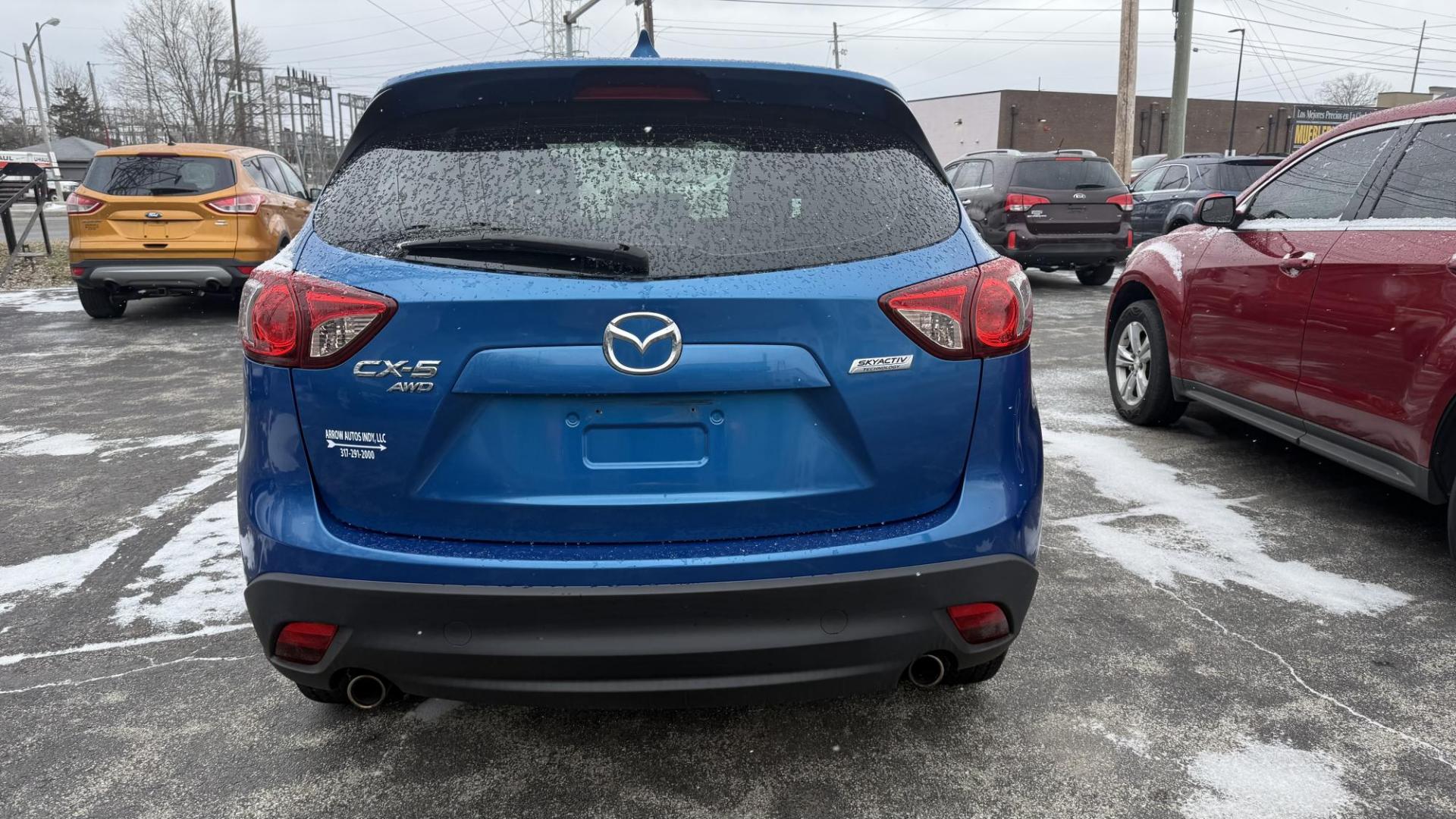 2013 BLUE /GRAY Mazda CX-5 Sport AWD (JM3KE4BE7D0) with an 2.0L L4 DOHC 16V engine, 6-Speed Automatic transmission, located at 2710A Westlane Rd., Indianapolis, IN, 46268, (317) 291-2000, 39.885670, -86.208160 - Photo#5